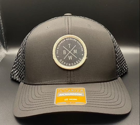 The Blackman Working Trucker Hat