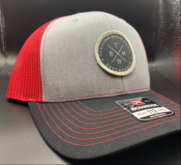 The Blackman Working Trucker Hat