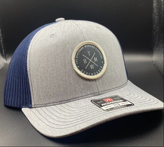 The Blackman Working Trucker Hat